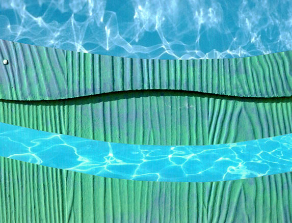 White lines of reflections filtering through turquoise water combined with faux-wood 