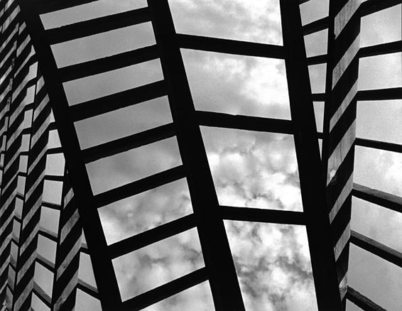 B&W wooden grid with clouds