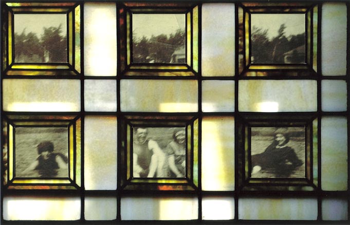 Black and White photo of peopel sitting in in the water at the edge of a lake in the grid if a Tiffany stained glass window.