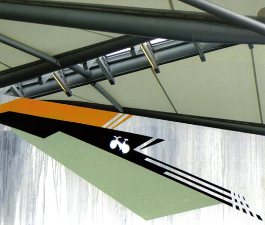 Geometric graffiti, white bike with green, black, yellow and gray drips