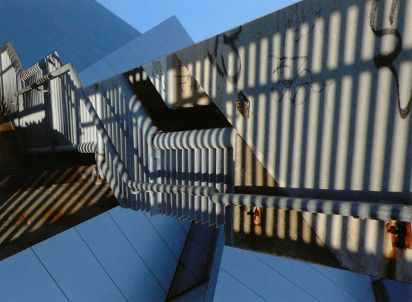 Shadow stripes on stairs, New Jersey Vertical lines, shadows and stair railings, forming a zig-zag