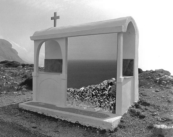 Monastery bus stop, Amorgos Greece B&W landscape, bus stop shelter with a cross on top