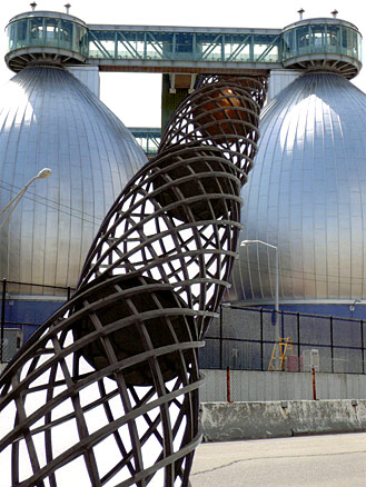 Onion domes of the swage treatment plant, Greenpoint, New York City Bulging round forms - silver and diamond-mesh - rise into the sky