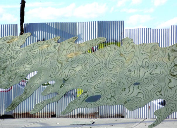 Rippling reflection of a fence, Queens, New York City Wavy lines on rippling water float above straight lines of a corrugated metal fence