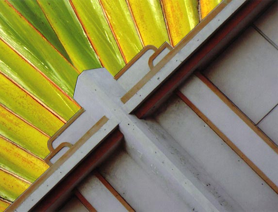 Deco building with palm, Miami Beach Yellow and white Deco building with yellow and green palm frond